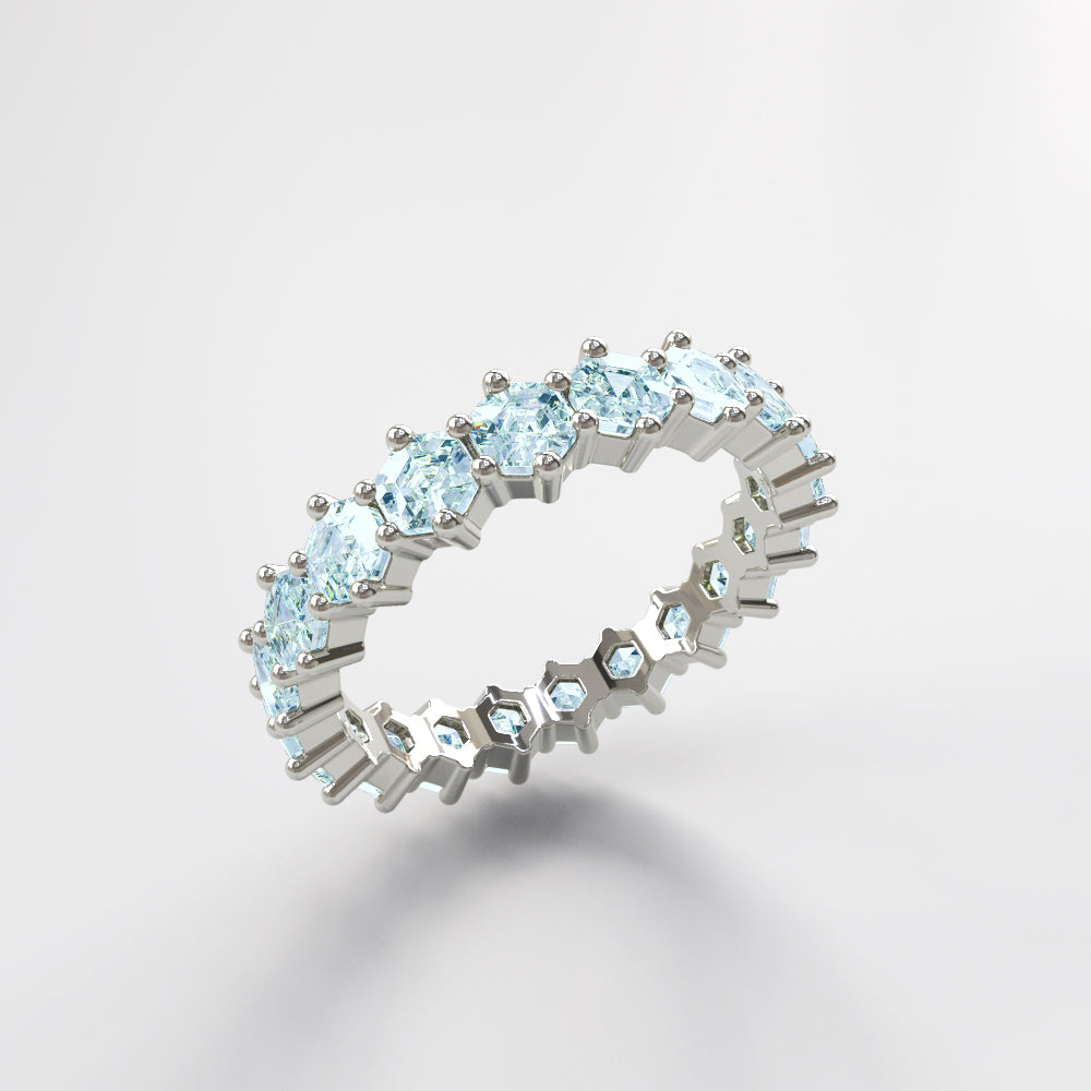 Elara blue topaz ring