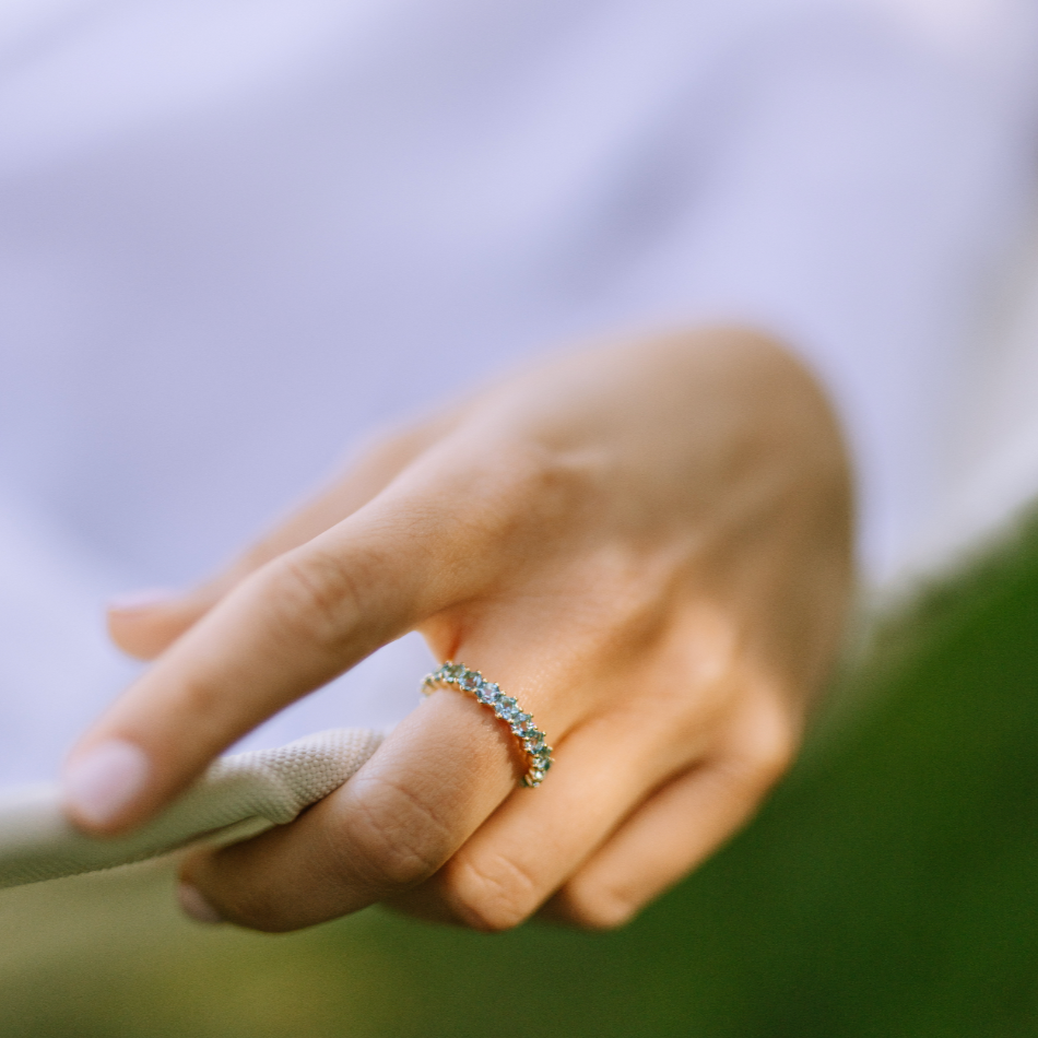 Elara blue topaz ring